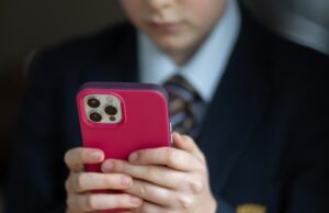 Mobile phones to be banned in schools in England under new plans