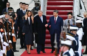 Trump gives Xi Jinping rare airport welcome as summit visit begins